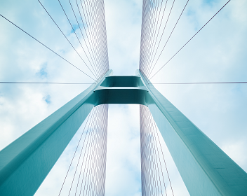 View of the sky from a modern suspension bridge