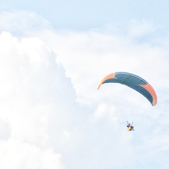 Parachute in clouds