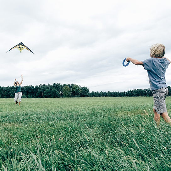 children flying kite